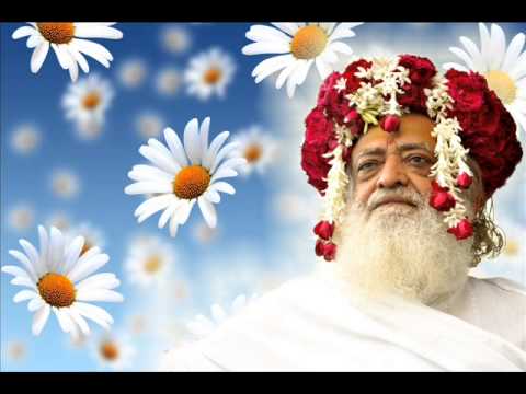 asaram bapu against a blue background and flowers