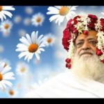 asaram bapu against a blue background and flowers