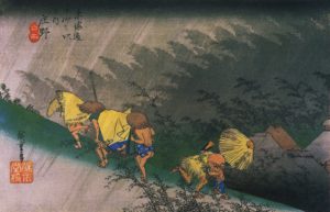 Travellers surprised by sudden rain