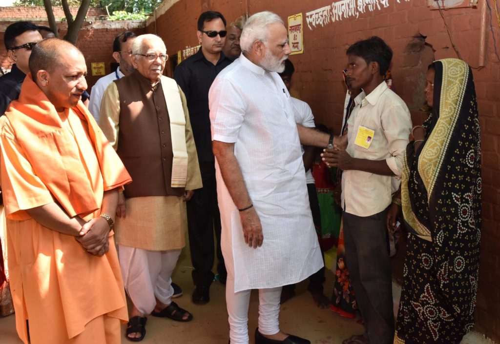 Modi and Adityanath interacting with people at Shahanshahpur varanasi