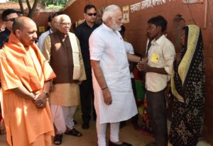 Modi and Adityanath interacting with people at Shahanshahpur varanasi